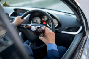 person drinking and driving