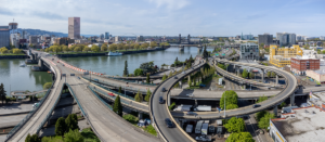 Highways, bridges, buildings and the Willamette River create this scenic aerial view of Portland, Oregon